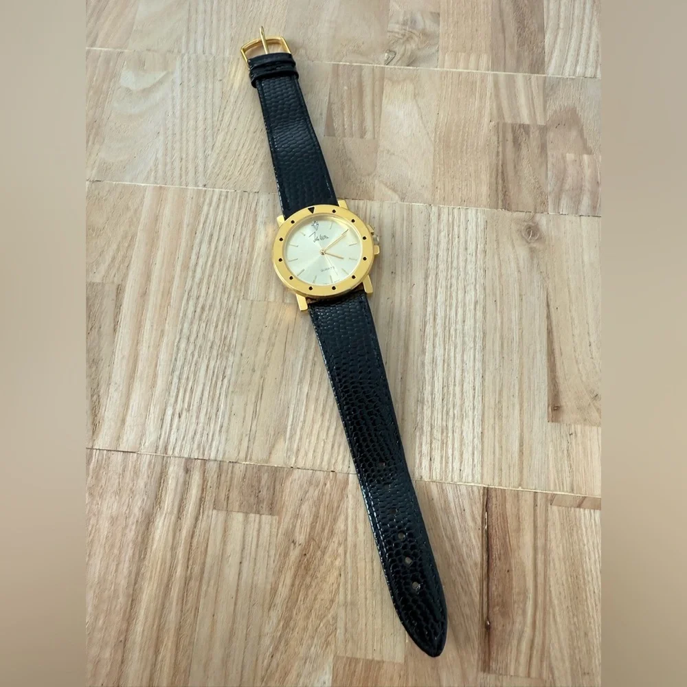 Vintage John weitz gold tone black leather watch NEW BATTERY